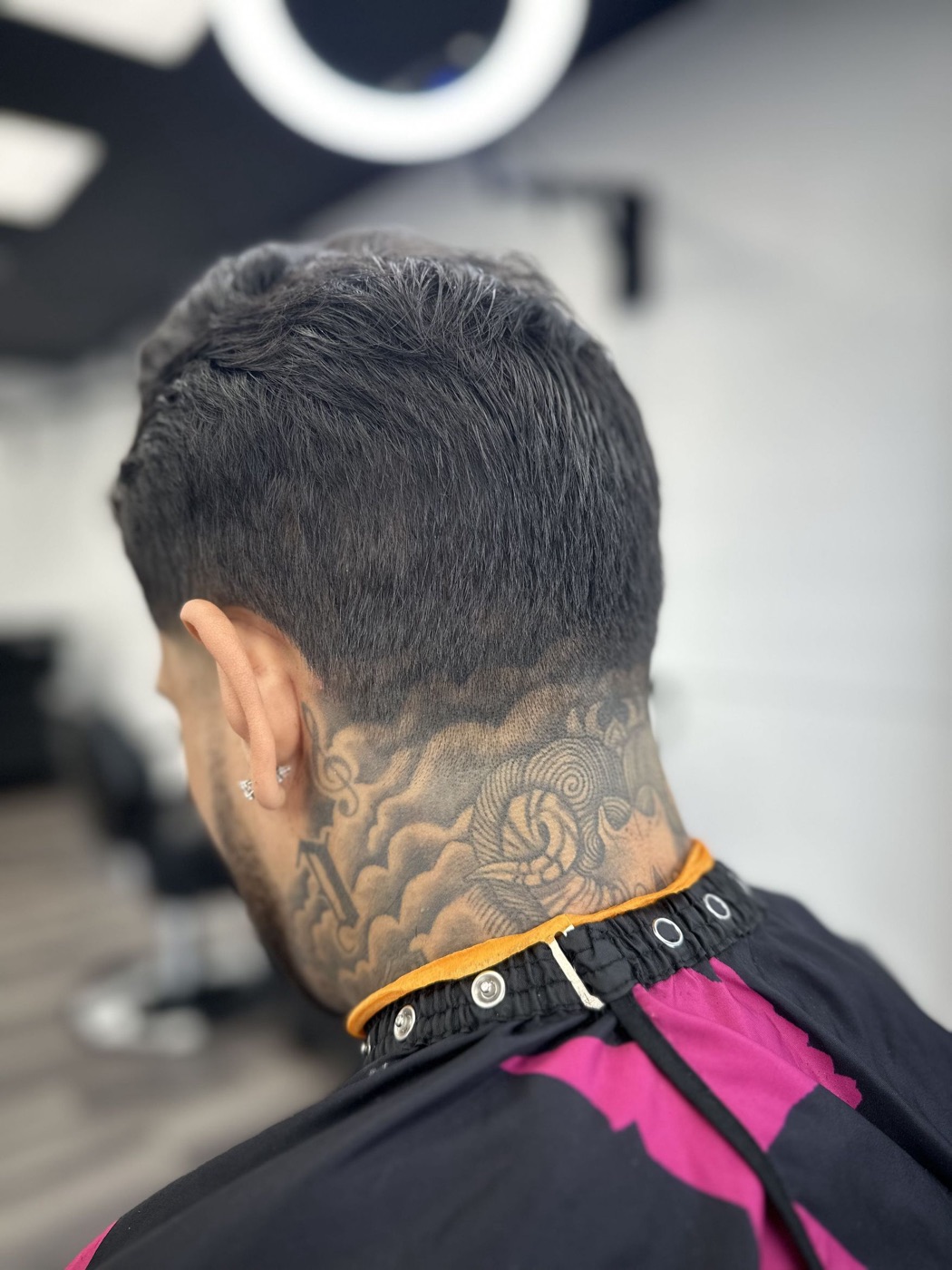 Clean taper with a sharp neckline