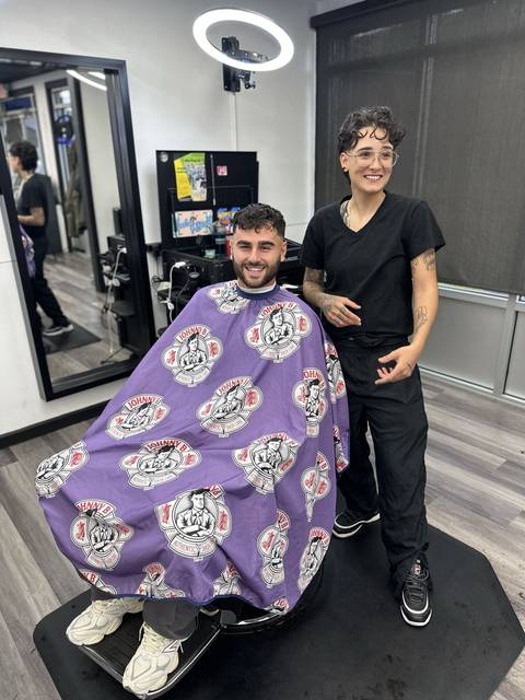 Steph and a client after the cut