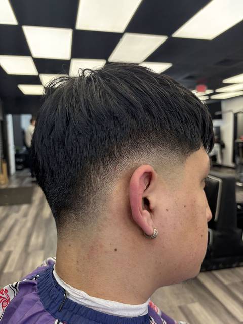 Textured crop with a faded back