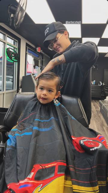 Toddler in the barber chair
