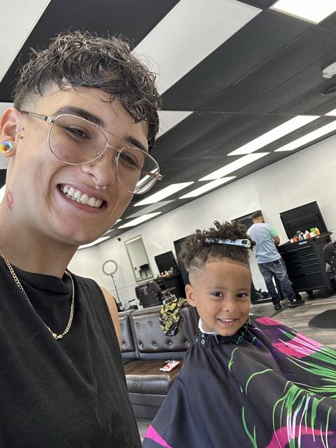Steph and a young client after the cut